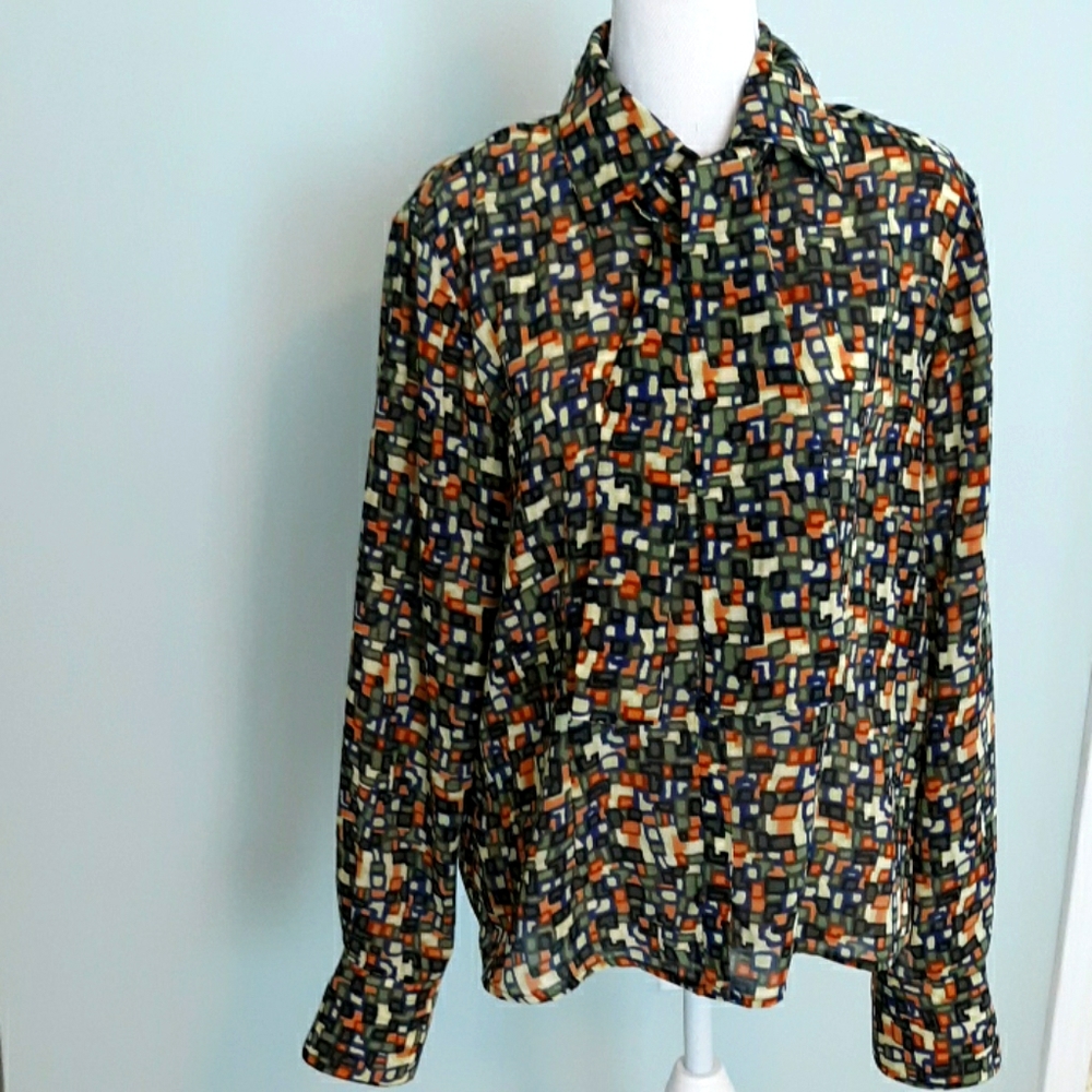 Multi print blouse with self sash.